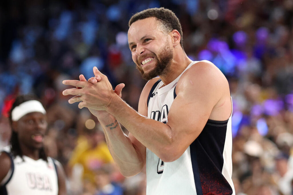 PARIS, FRANCE - AUGUST 08: Stephen Curry #4 of Team United States reacts after his team's victory against Team Serbia during the Men's basketball semifinals match between Team United States and Team Serbia on day ten three of the Olympic Games Paris 2024 Bercy Arena in August. 08, 2024 Paris, France. (Photo by Ezra Shaw/Getty Images)